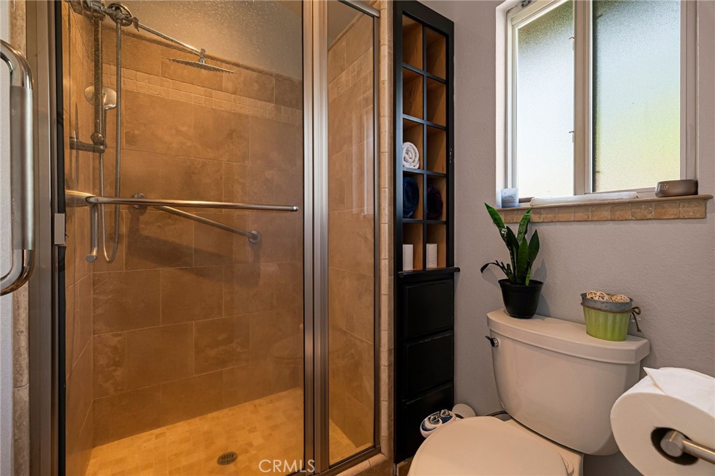 13 Avante Way Chico, CA 95973 - Photo 29 of 58 a bathroom with a toilet and a shower