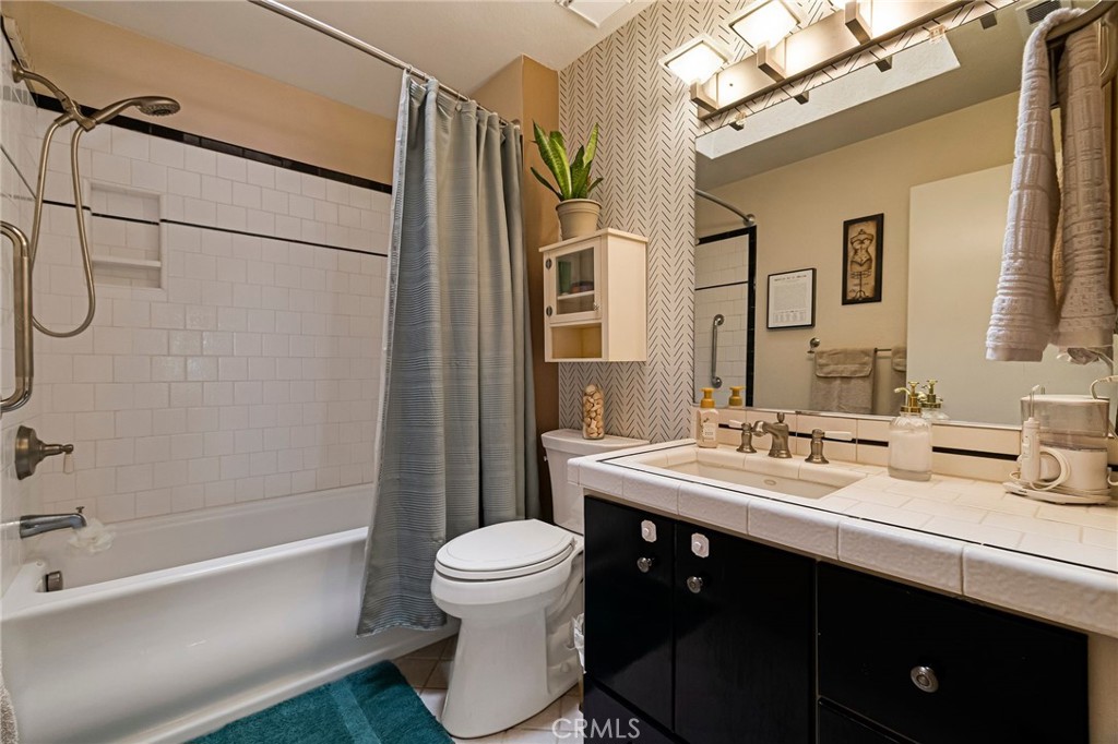 13 Avante Way Chico, CA 95973 - Photo 32 of 58 a bathroom with a sink vanity mirror and toilet