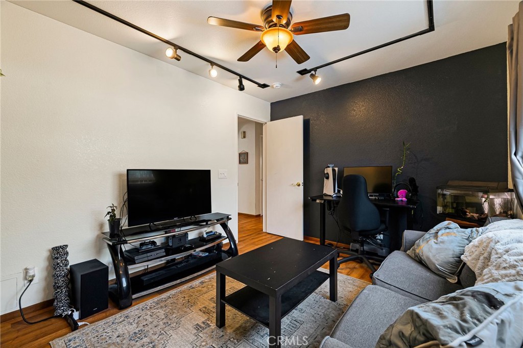 13 Avante Way Chico, CA 95973 - Photo 34 of 58 a living room with furniture and a flat screen tv