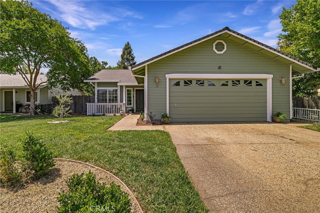 13 Avante Way Chico, CA 95973 - Photo 4 of 58 a front view of a house with a yard