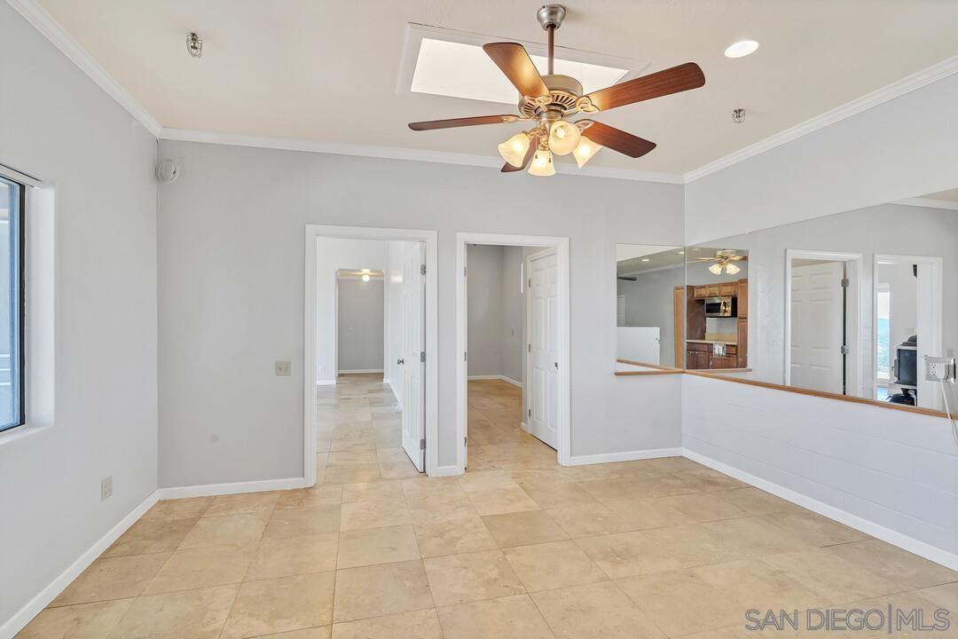 23611 Old Ranch Road Alpine, CA 91901 - Photo 11 of 25 wooden floor in an empty room with a window