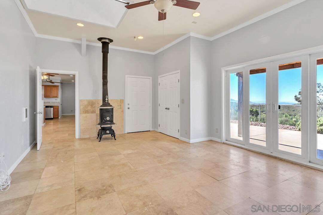 23611 Old Ranch Road Alpine, CA 91901 - Photo 12 of 25 a view of an empty room with a window