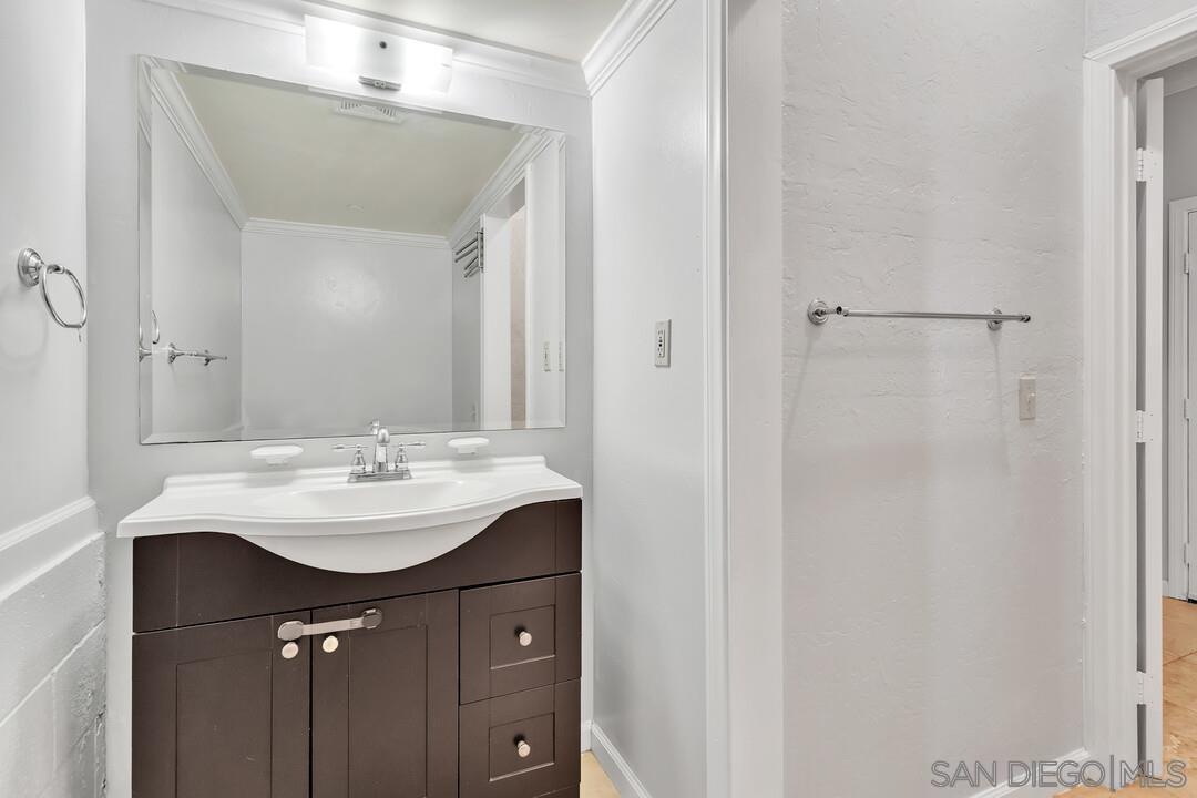 23611 Old Ranch Road Alpine, CA 91901 - Photo 14 of 25 a bathroom with a sink and a mirror