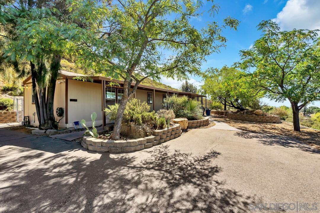 23611 Old Ranch Road Alpine, CA 91901 - Photo 5 of 25 a view of a house with backyard and tree