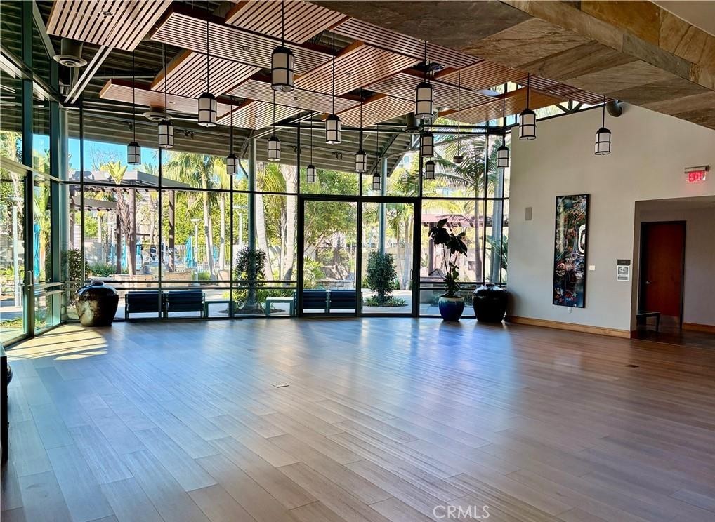 3608 Rivington Irvine, CA 92612 - Photo 47 of 74 a view of empty room with wooden floor and windows