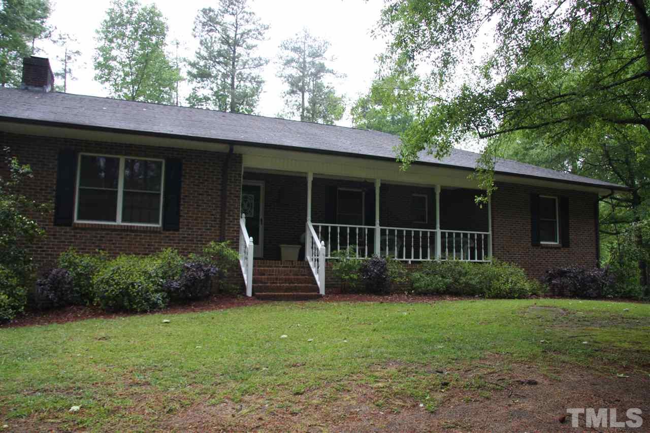 1825 Rc Watson Road Wendell, NC 27591 - Photo 1 of 18 a view of a house that has a garden