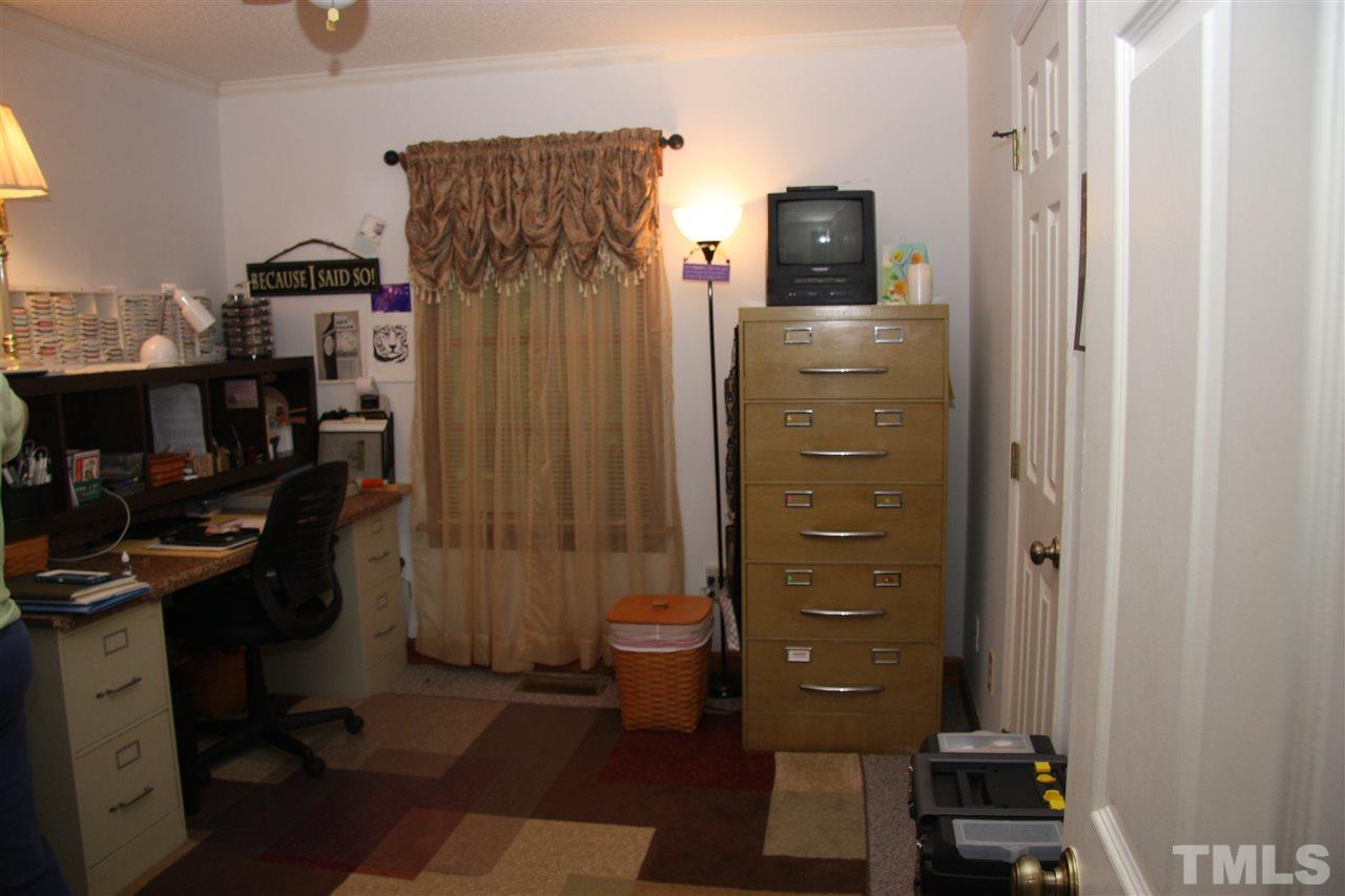 1825 Rc Watson Road Wendell, NC 27591 - Photo 14 of 18 a view of a livingroom with a tv