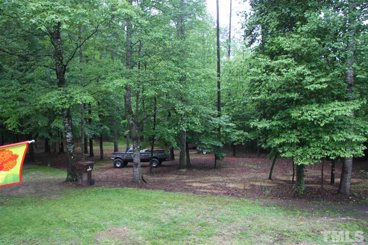 1825 Rc Watson Road Wendell, NC 27591 - Photo 17 of 18 a view of a backyard with sitting area