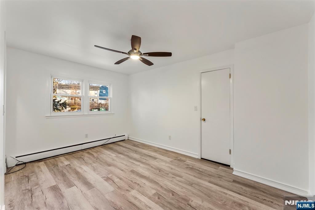 1 Dunn Road West Orange, NJ 07052 - Photo 14 of 20 a view of empty room with wooden floor