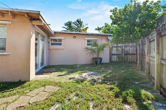 a view of a backyard with a garden