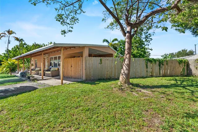 an aerial view of a house having yard