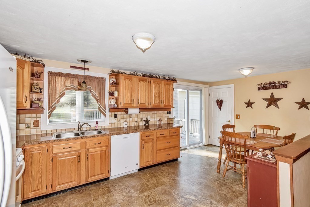 59 Corey Road Springfield, MA 01128 - Photo 7 of 22 a kitchen with a sink and cabinets