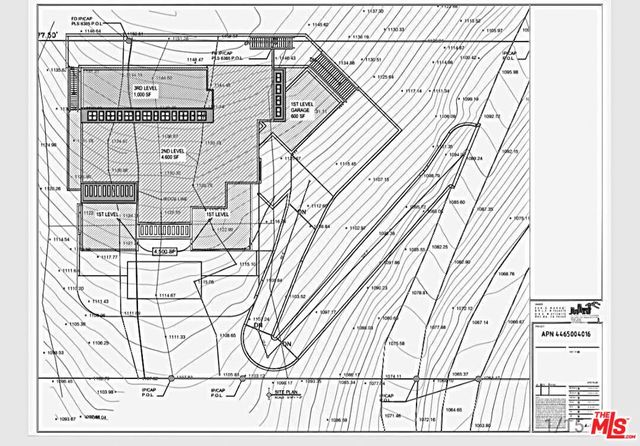 a view of a swimming pool and an outdoor seating