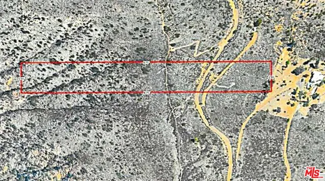 a view of a room with a swimming pool and mountains