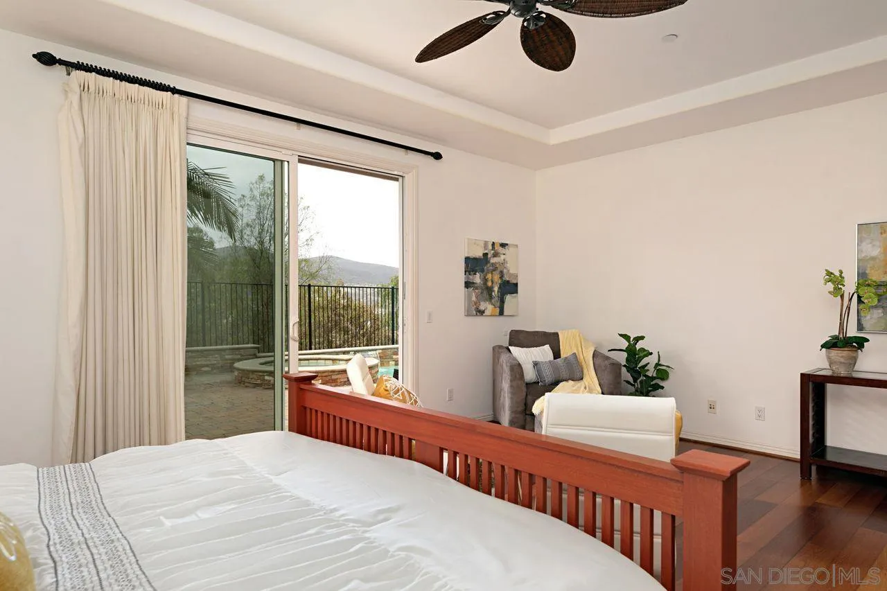 16076 Cayenne Ridge Road San Diego, CA 92127 - Photo 19 of 43 a bedroom with furniture and windows