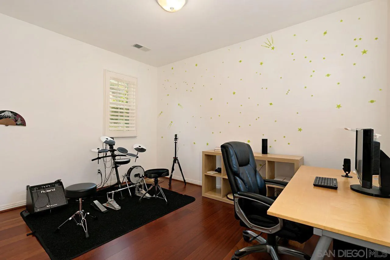 16076 Cayenne Ridge Road San Diego, CA 92127 - Photo 26 of 43 a view of a workspace with furniture and a window