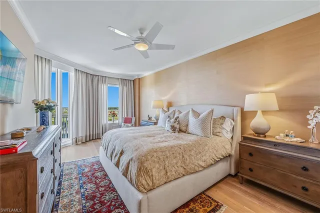 a bedroom with a bed and lamp with window