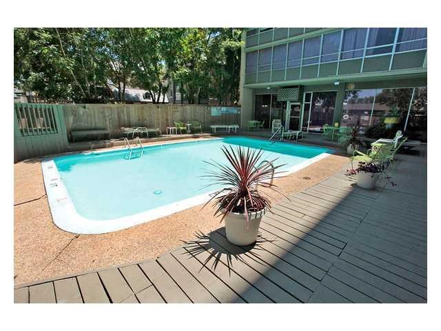 1800 Lavaca Street, Unit 204 Austin, TX 78701 - Photo 3 of 12 a view of swimming pool with outdoor seating and plants