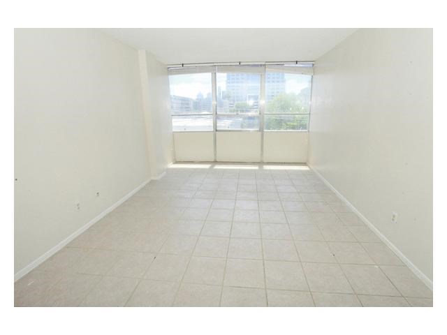 1800 Lavaca Street, Unit 204 Austin, TX 78701 - Photo 5 of 12 a view of an empty room with a window