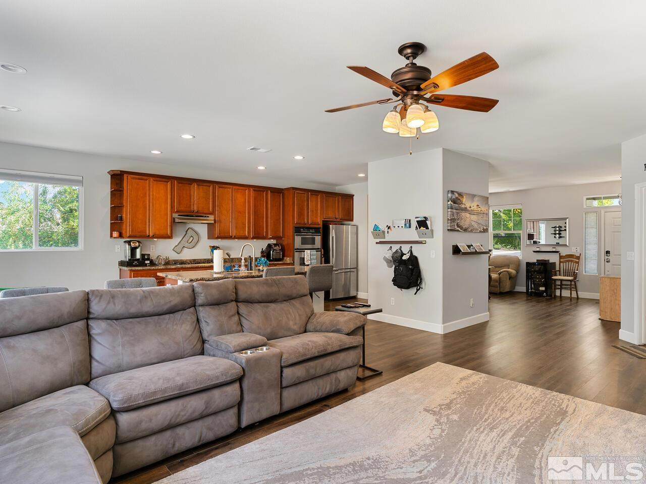10805 Dancing Aspen Drive Reno, NV 89521 - Photo 11 of 25 a living room with furniture kitchen view and a window