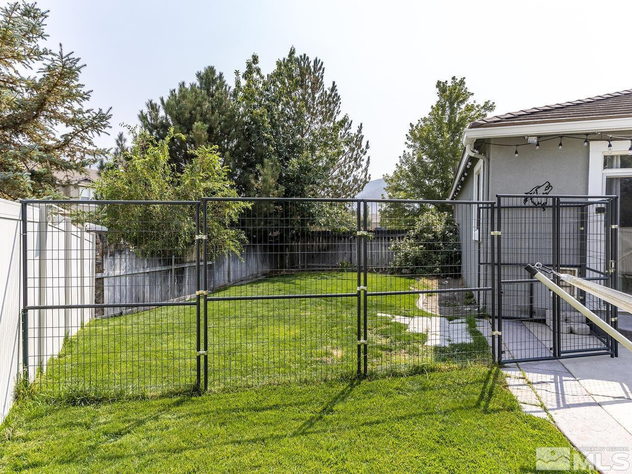 10805 Dancing Aspen Drive Reno, NV 89521 - Photo 25 of 25 a view of a backyard
