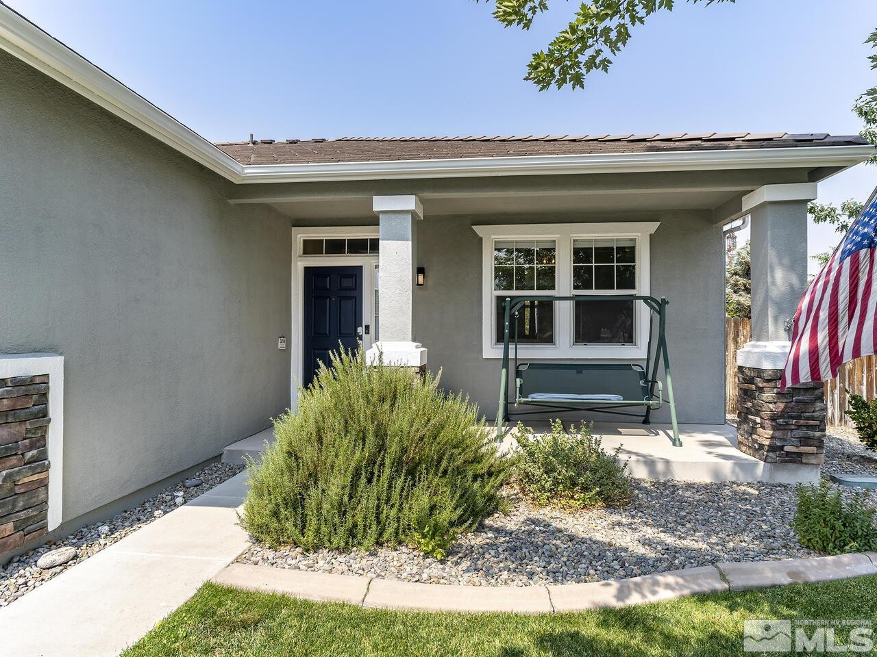 10805 Dancing Aspen Drive Reno, NV 89521 - Photo 4 of 25 a front view of a house