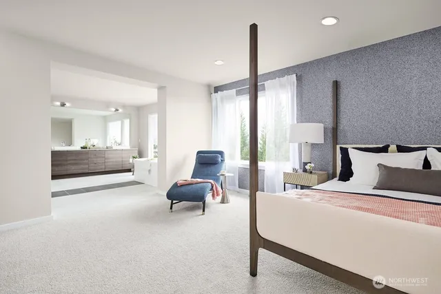 a bedroom with bed and a night stand