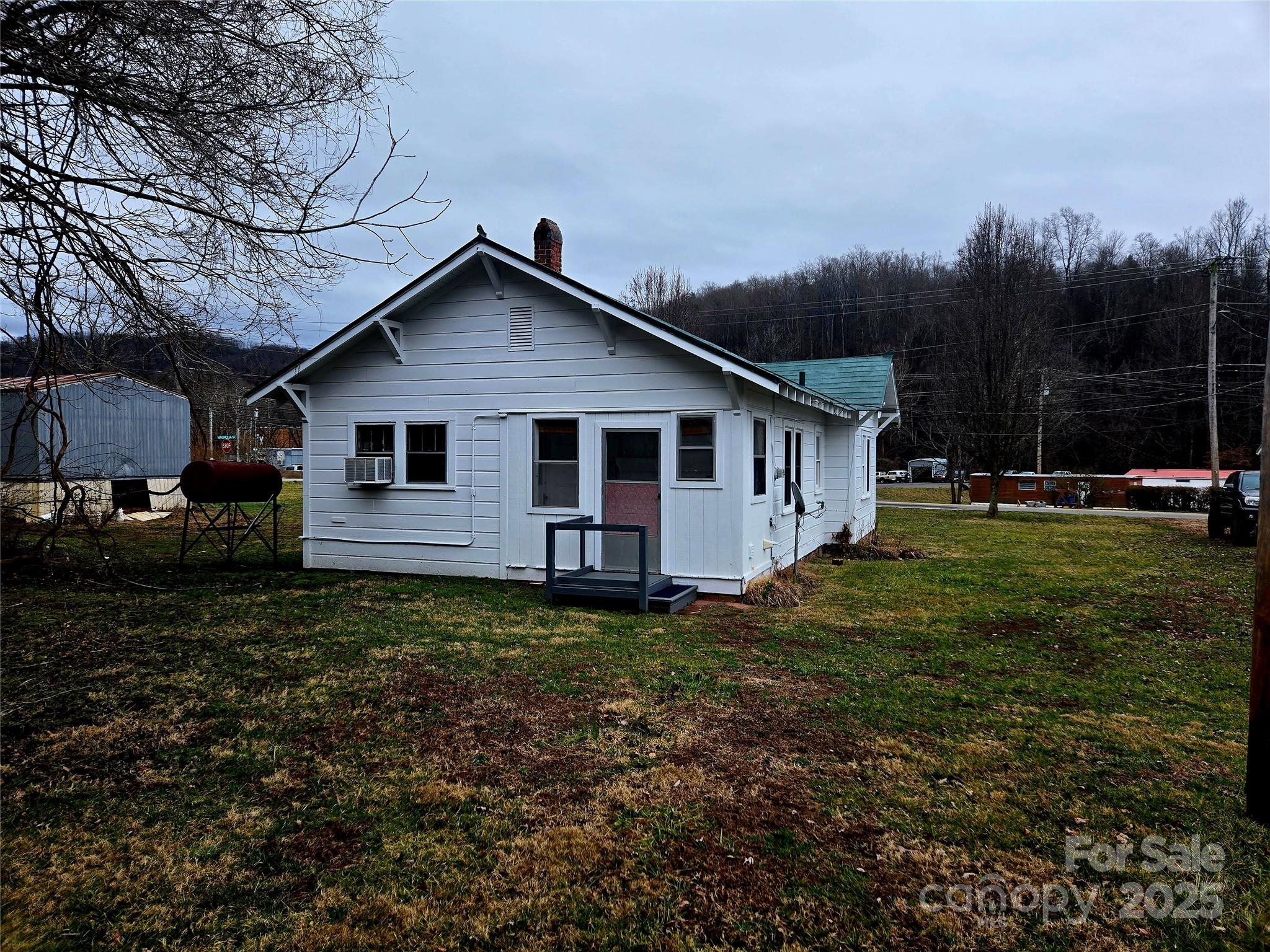 999 Chipper Curve Road Sylva, NC 28779 - Photo 16 of 17 a view of a yard in front of house