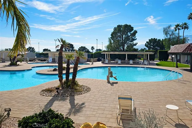 a view of a swimming pool with a lake