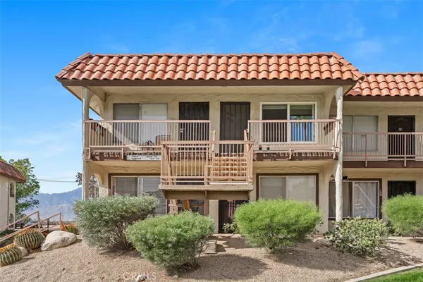 front view of a house with a balcony
