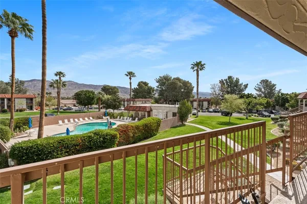 a view of a city skyline from a balcony