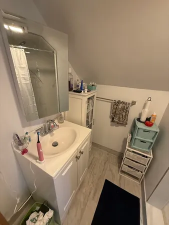 a view of a balcony with chairs