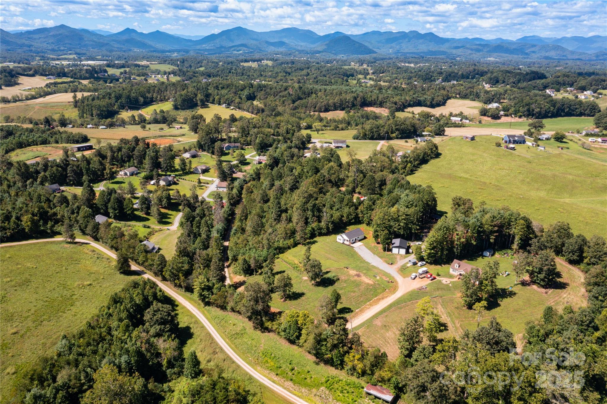 653 Mag Sluder Road Alexander, NC 28701 - Photo 24 of 28 an aerial view of residential houses with outdoor space