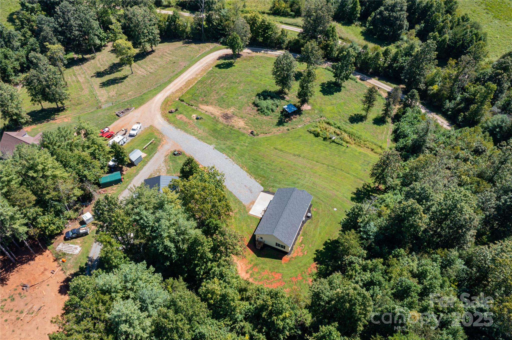 653 Mag Sluder Road Alexander, NC 28701 - Photo 26 of 28 an aerial view of a house with yard swimming pool and outdoor seating