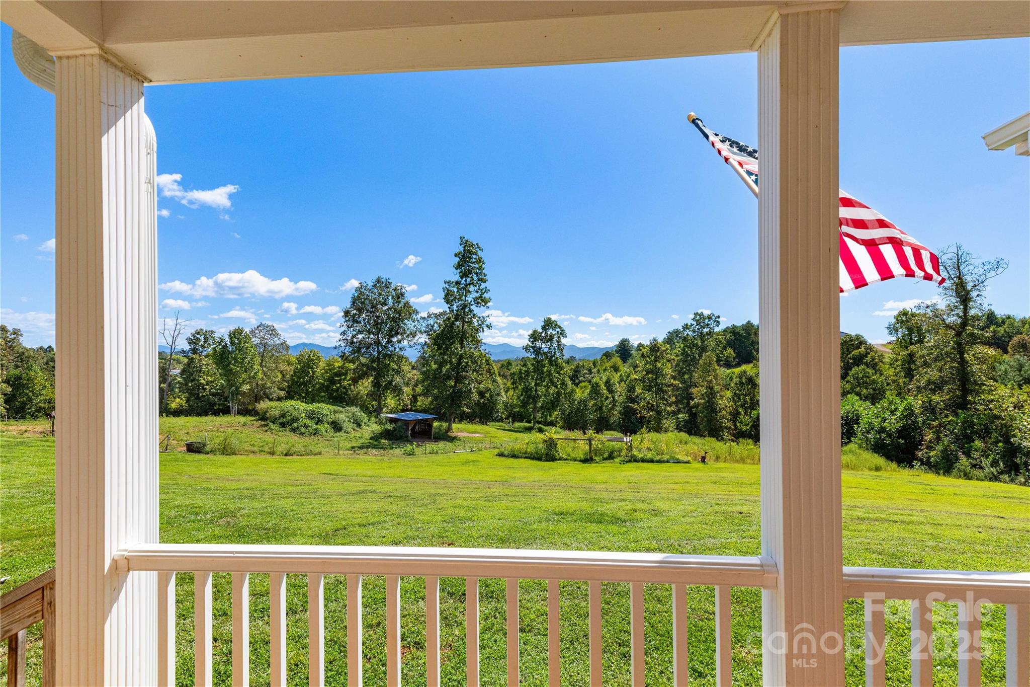653 Mag Sluder Road Alexander, NC 28701 - Photo 3 of 28 a view of a city from a balcony
