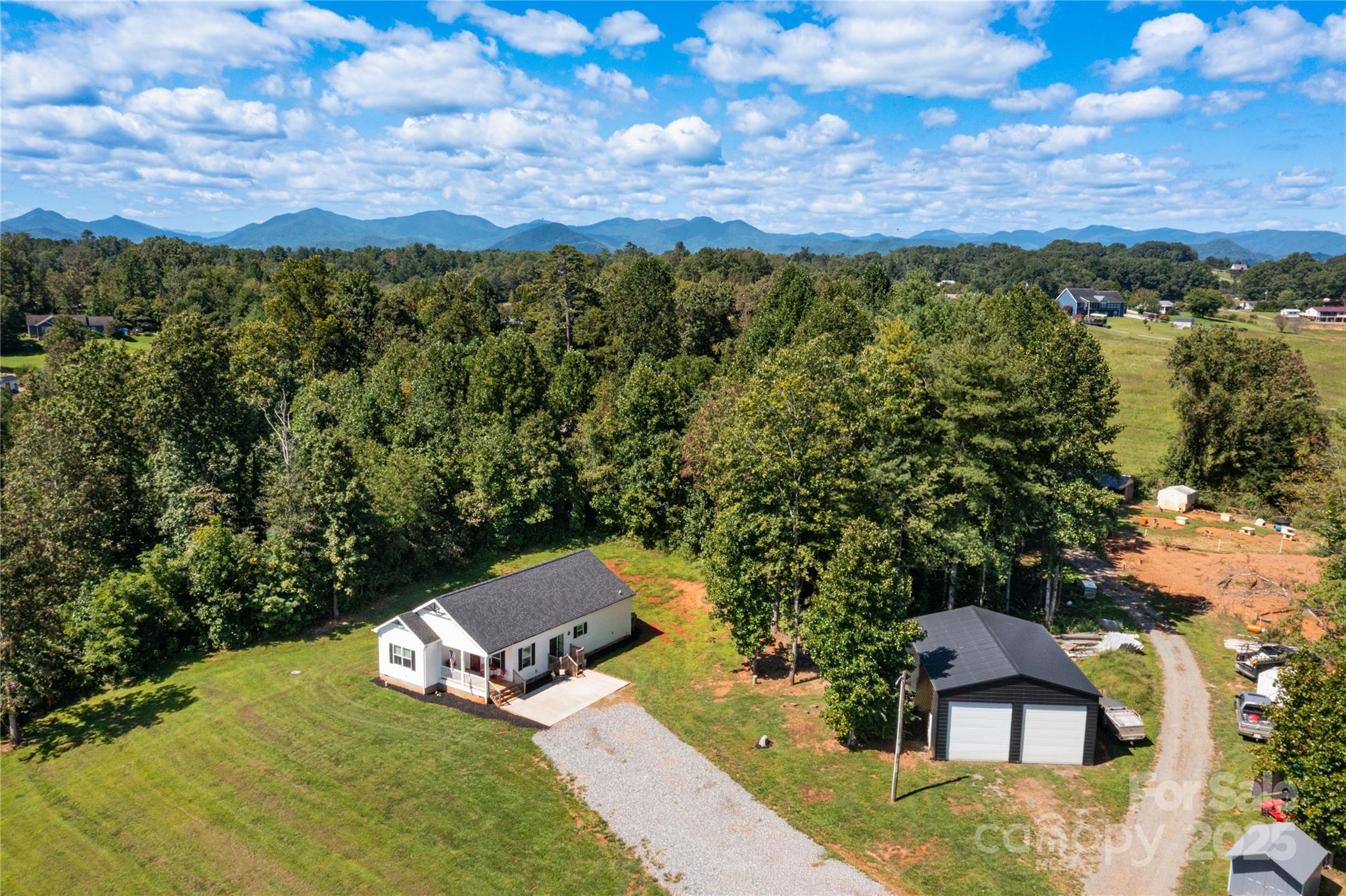 653 Mag Sluder Road Alexander, NC 28701 - Photo 4 of 28 an aerial view of a house