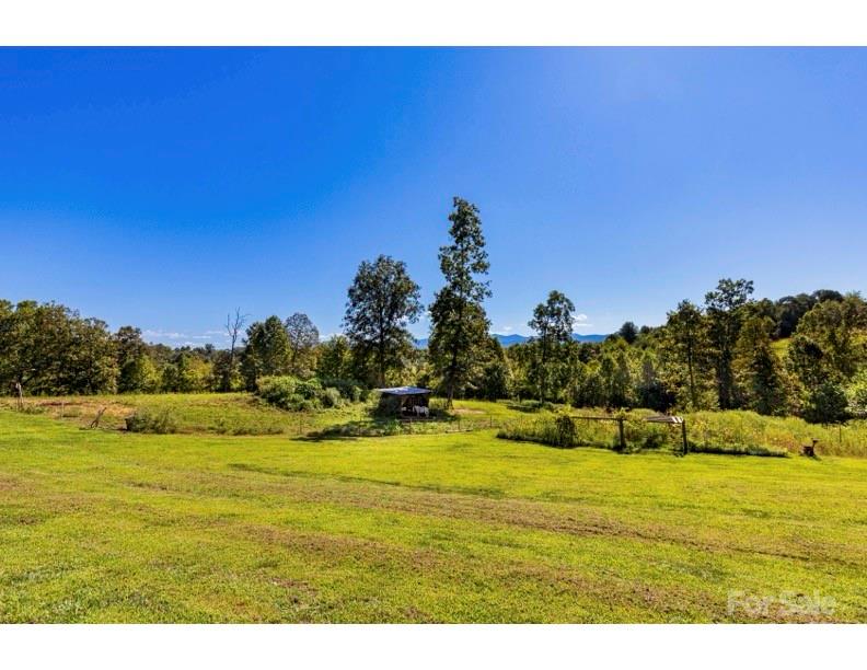 653 Mag Sluder Road Alexander, NC 28701 - Photo 6 of 28 a view of an ocean and a mountain