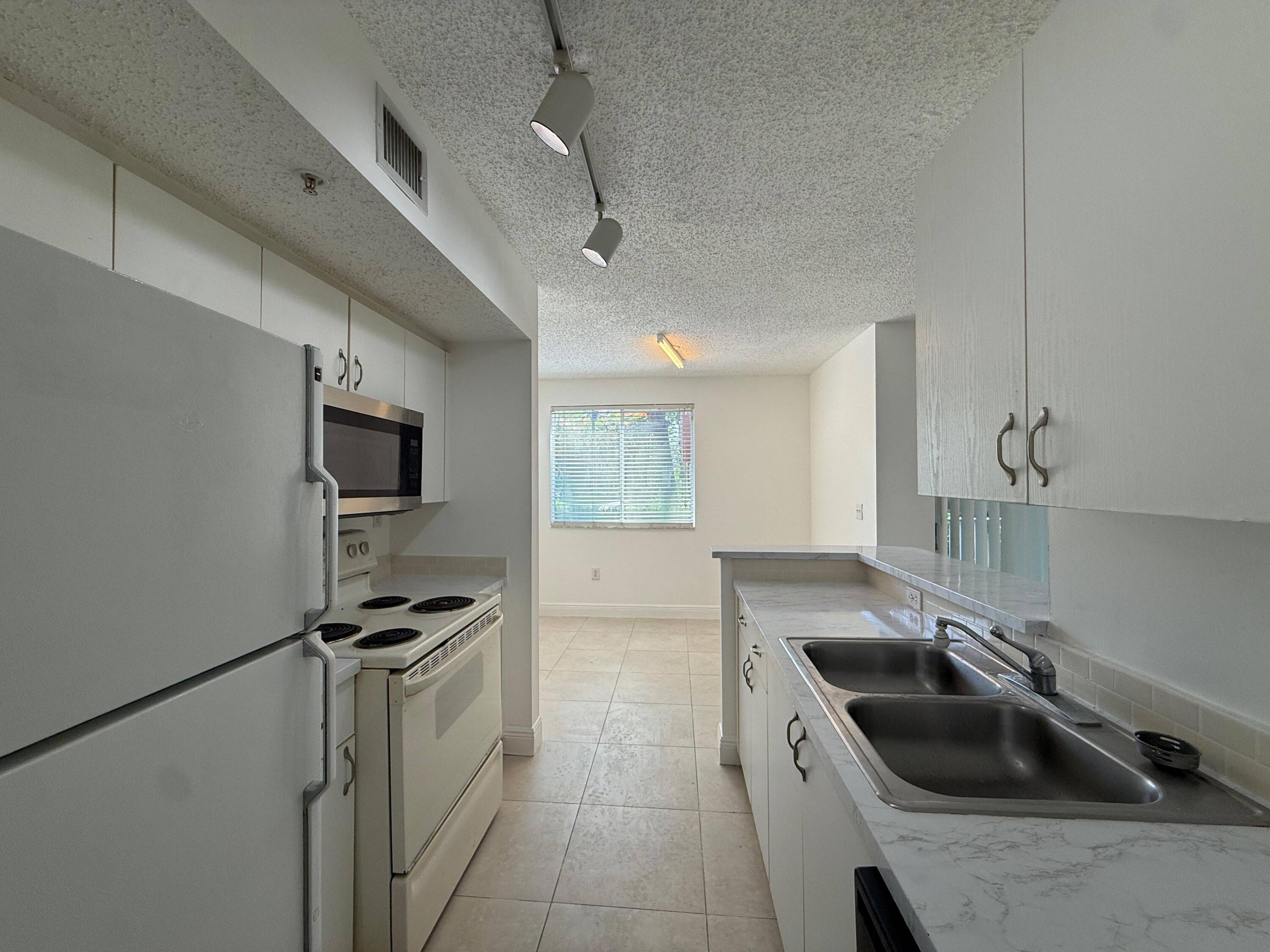 3874 Lyons Road, Unit 1106 Coconut Creek, FL 33073 - Photo 2 of 23 WhatsApp Image 2026-06-25 at 00.53.17 (7