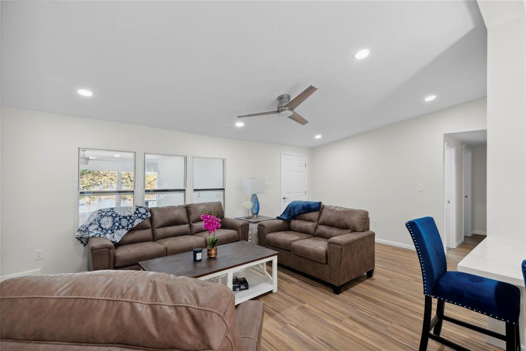 141 Mallard Road Ringgold, LA 71068 - Photo 14 of 33 Spacious living area featuring wood-finish flooring, recessed lighting, and a modern ceiling fan