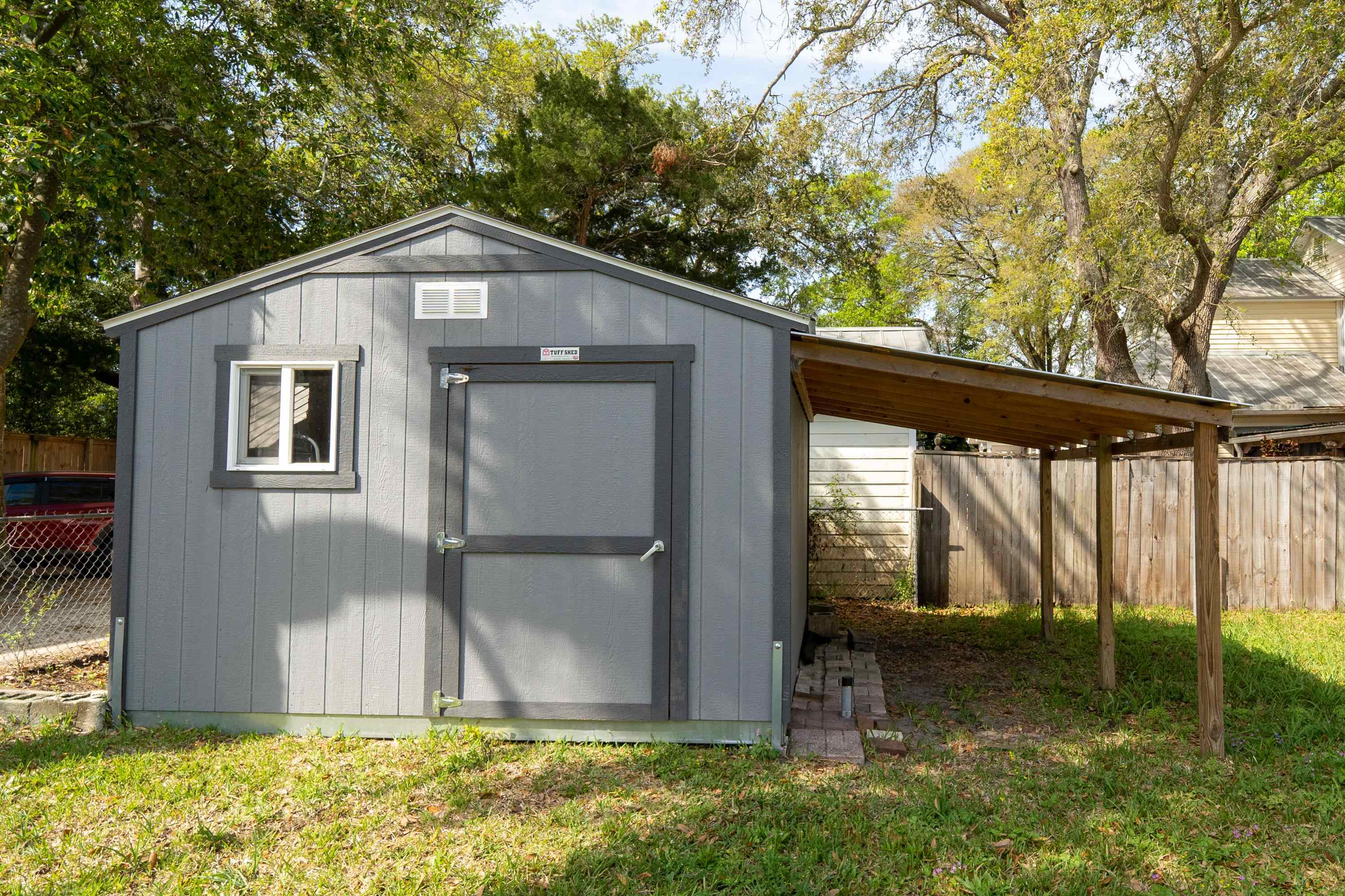 23 Hope Street St. Augustine, FL 32084 - Photo 20 of 22 a backyard of a house with lots of green space