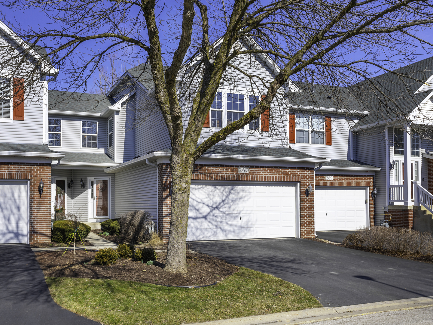 267 Ridge Road North Aurora, IL 60542 - Photo 1 of 27 a view of a house with large windows