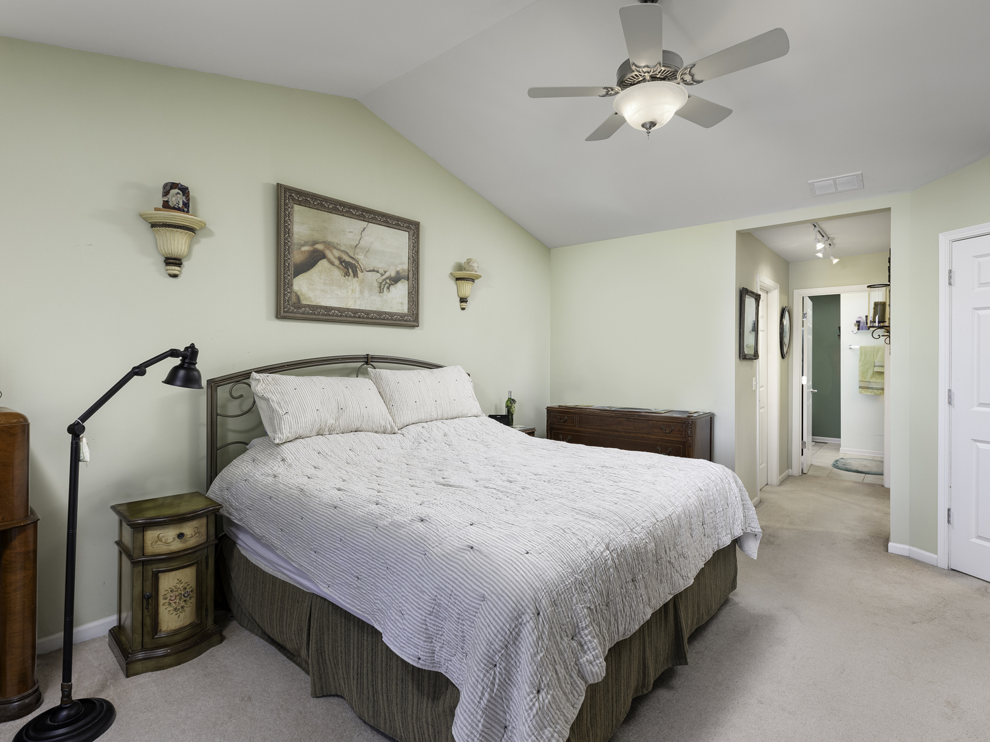 267 Ridge Road North Aurora, IL 60542 - Photo 20 of 27 a bedroom with a bed and a chandelier