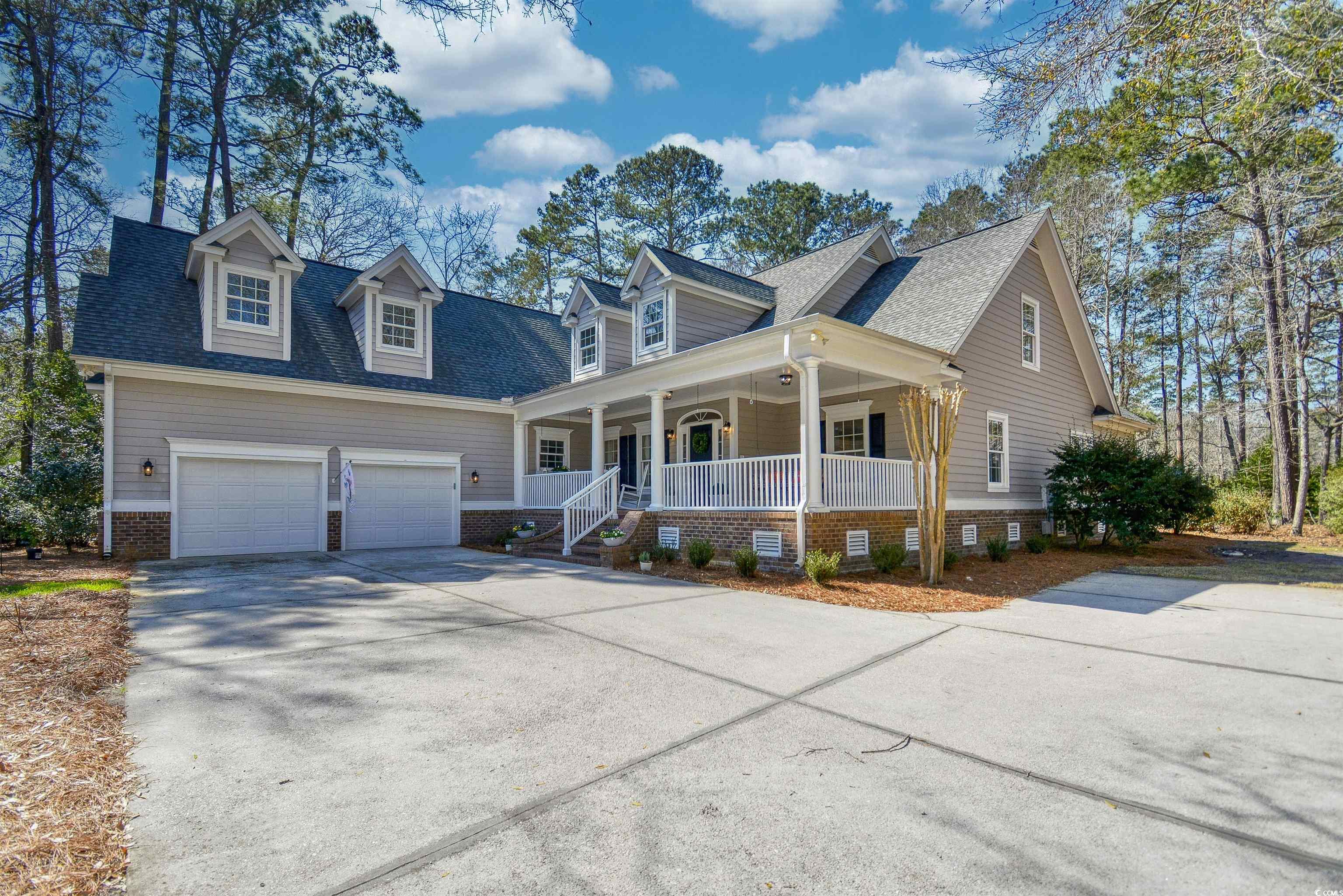 4514 Wagon Run Murrells Inlet, SC 29576 - Photo 2 of 40 Cape cod house with a garage, driveway, a shingled