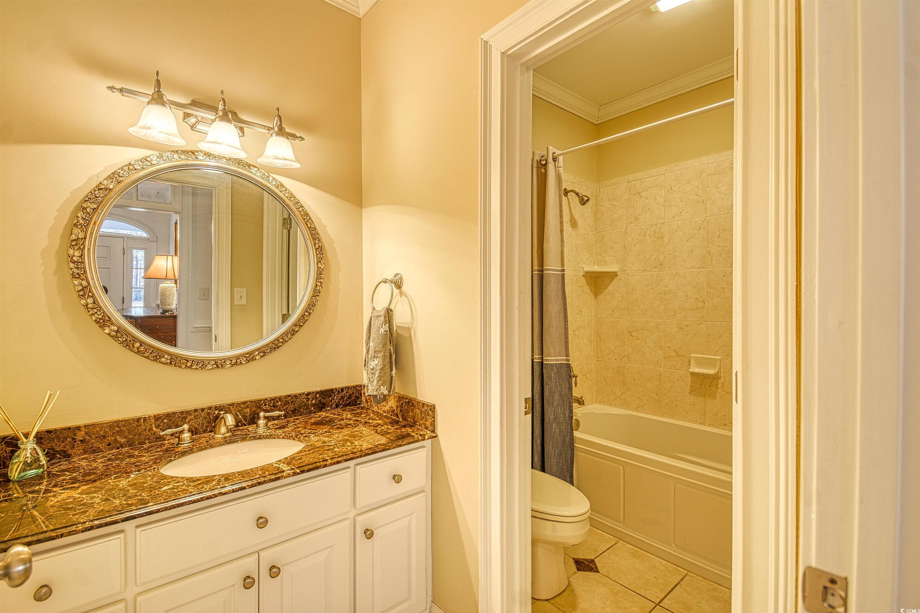 4514 Wagon Run Murrells Inlet, SC 29576 - Photo 24 of 40 Bathroom with tile patterned flooring, toilet, van