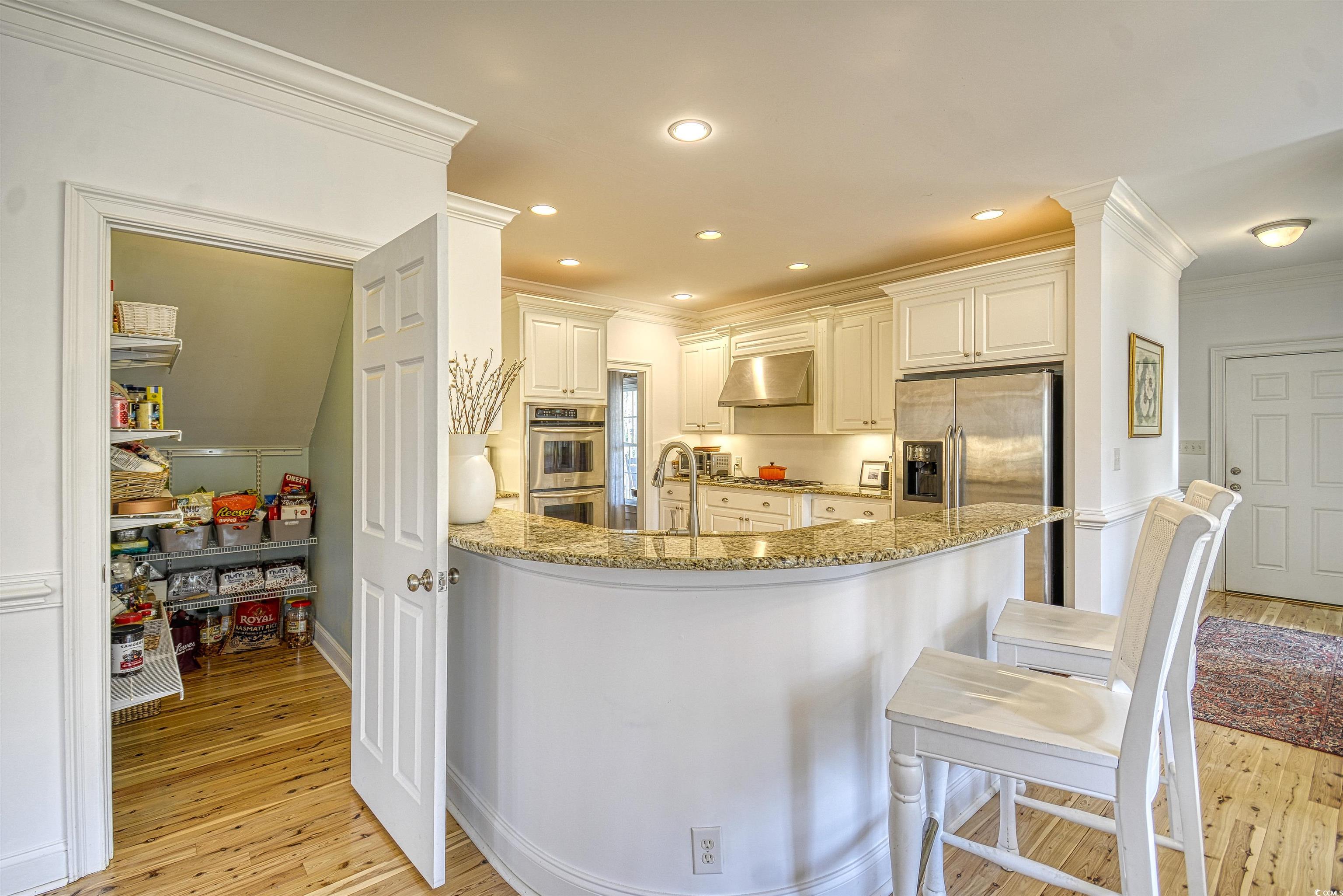 4514 Wagon Run Murrells Inlet, SC 29576 - Photo 26 of 40 Kitchen featuring light stone countertops, under c