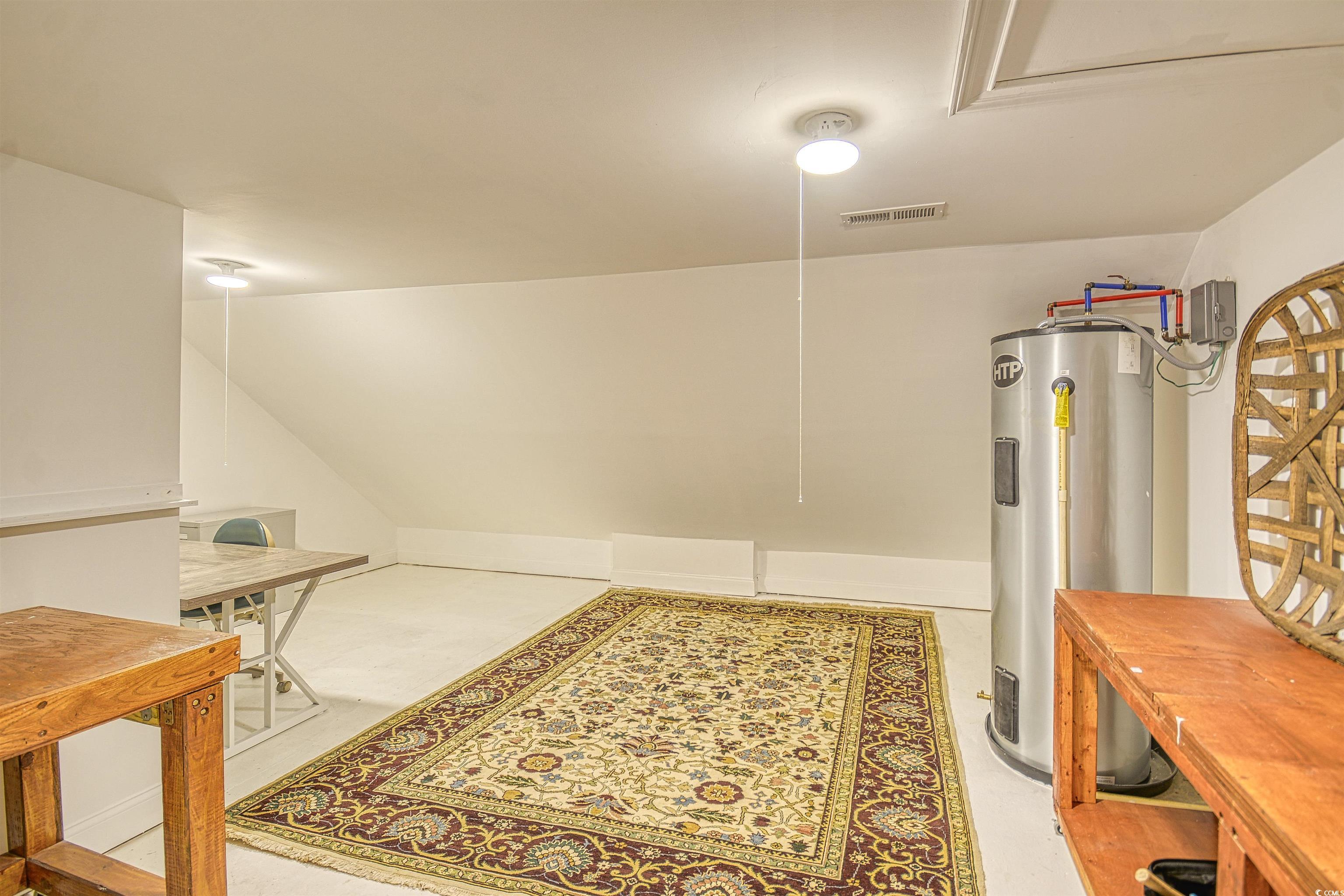 4514 Wagon Run Murrells Inlet, SC 29576 - Photo 28 of 40 Interior space featuring water heater and visible