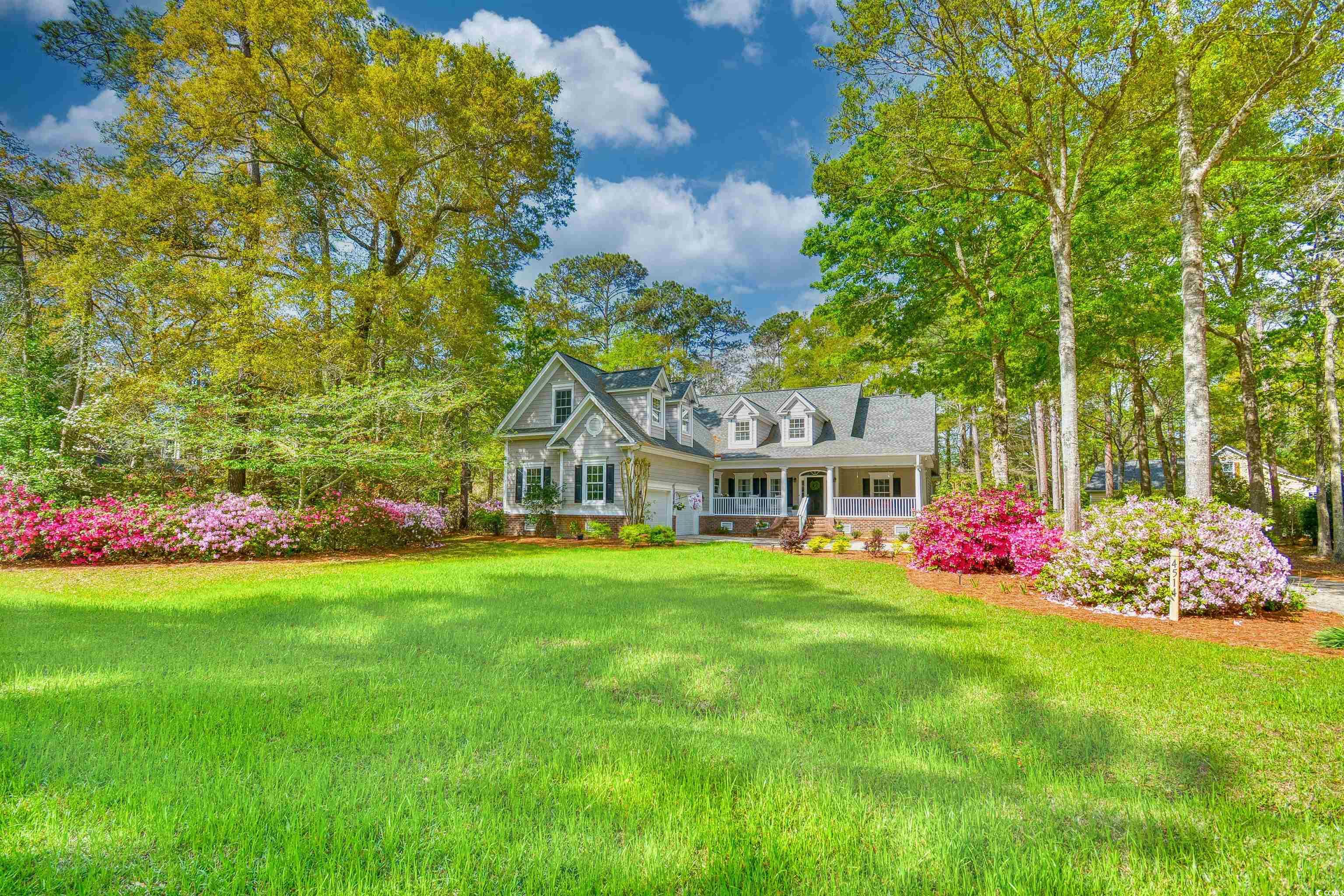 4514 Wagon Run Murrells Inlet, SC 29576 - Photo 29 of 40 Cape cod house featuring a porch and a front yard