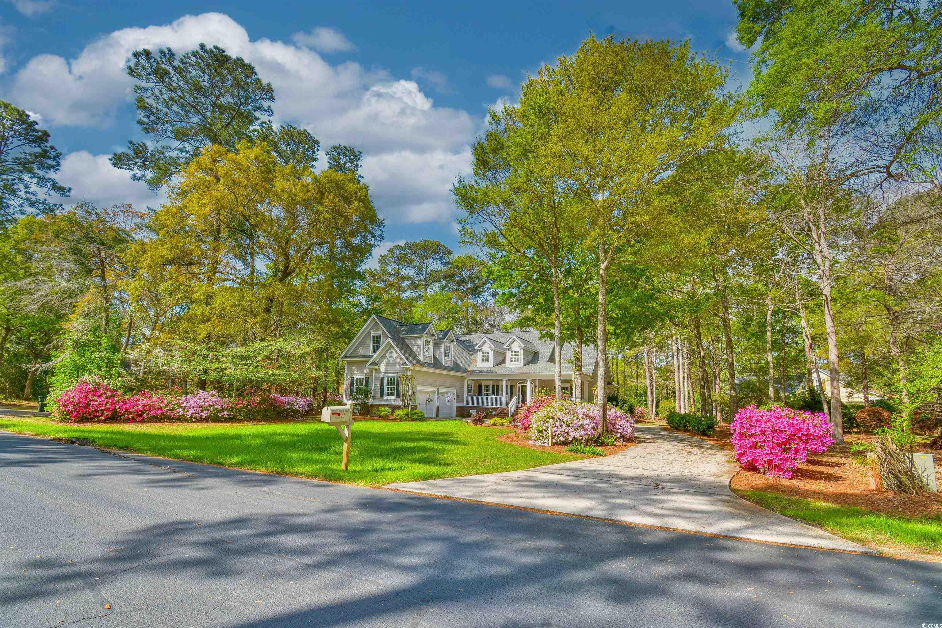 4514 Wagon Run Murrells Inlet, SC 29576 - Photo 31 of 40 View of front of home with a front yard and concre