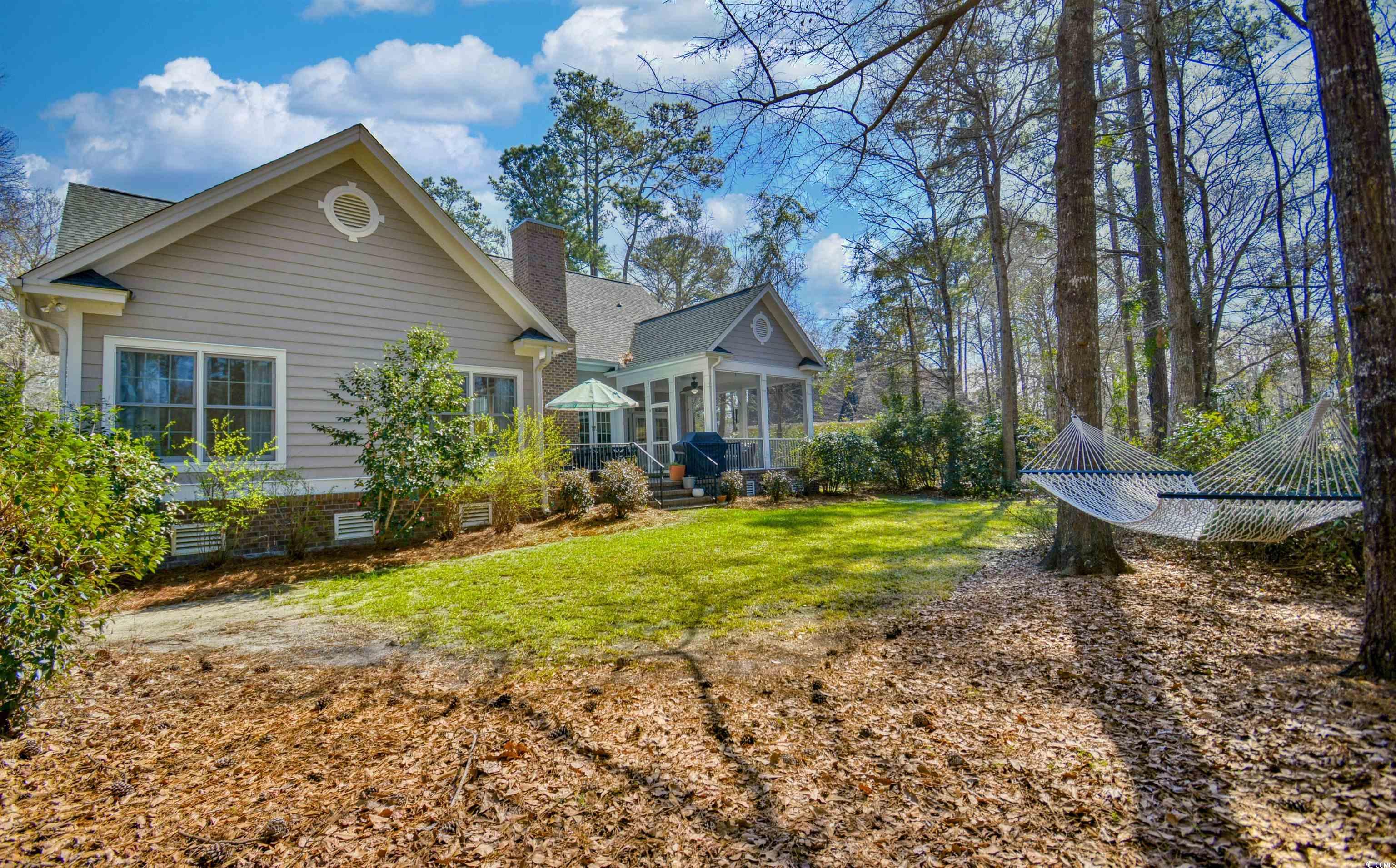 4514 Wagon Run Murrells Inlet, SC 29576 - Photo 37 of 40 Back of property featuring crawl space, a sunroom,
