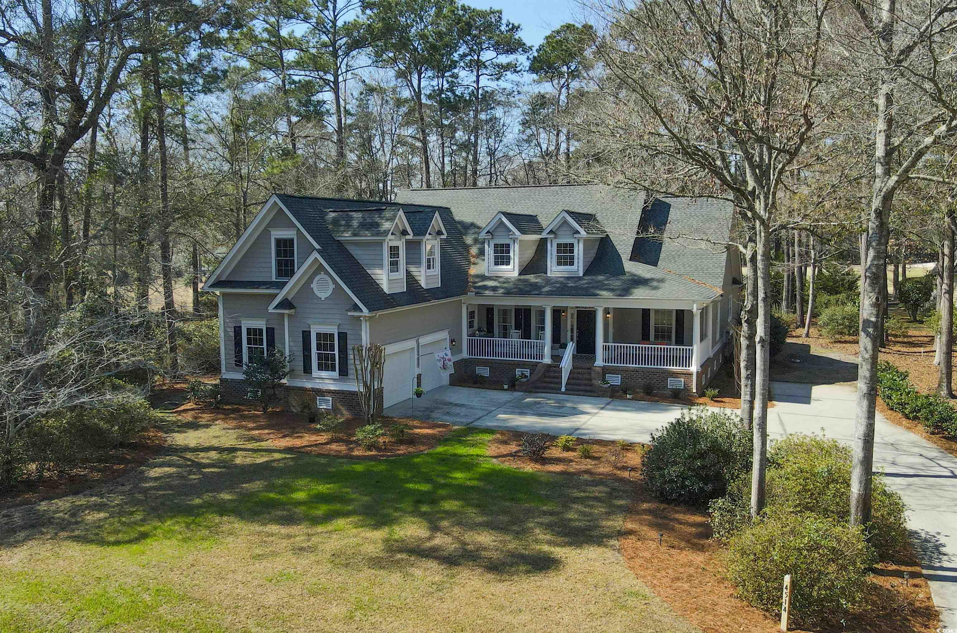 4514 Wagon Run Murrells Inlet, SC 29576 - Photo 38 of 40 Cape cod home featuring covered porch, concrete dr